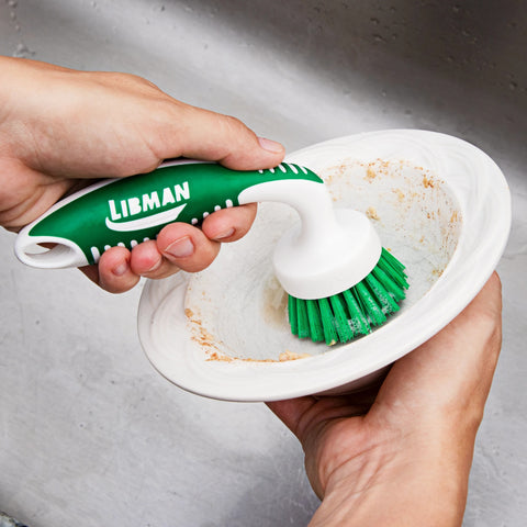 Curved Kitchen Brush 42 scrubbing a bowl