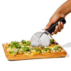 Pizza Wheel Cutting Pizza