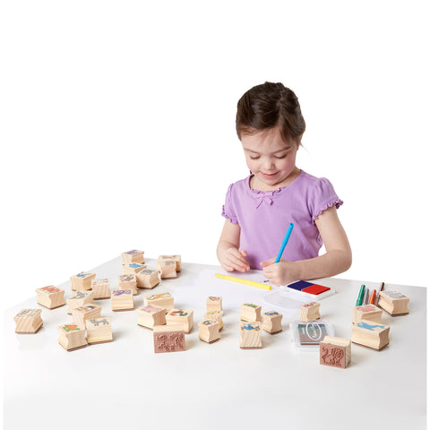 girl using stamp set