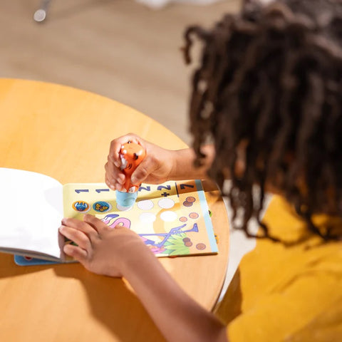 Child Stamping with Sticker Stamper