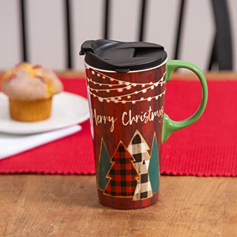 travel mug with muffin in background
