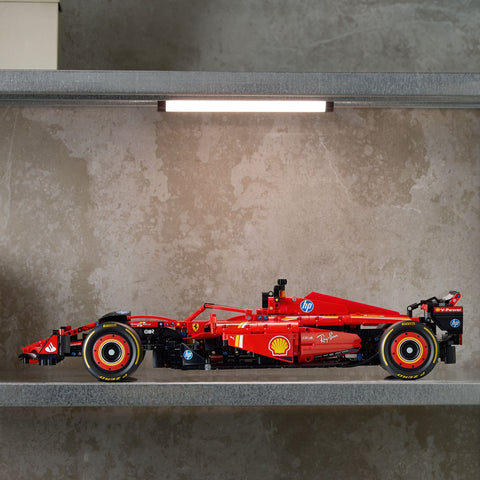 LEGO Technic Ferrari SF-24 F1 Car Model Kit for Adults 42207 on display on shelf