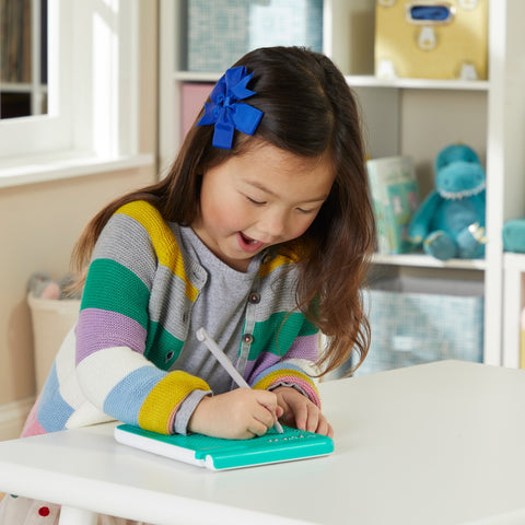 Girl Playing with Magnatab