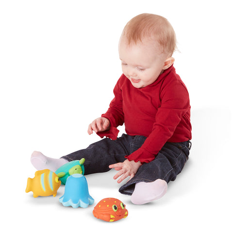 boy with squirt toys