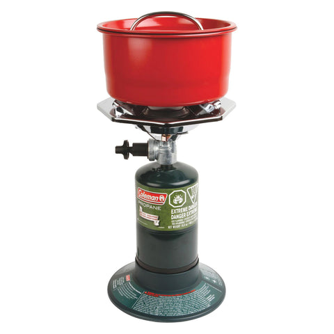 Coleman Bottle Top Propane Camping Stove with red pan on top