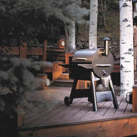 Traeger Pro Series 22 Bronze Pellet Grill on a deck outdoors