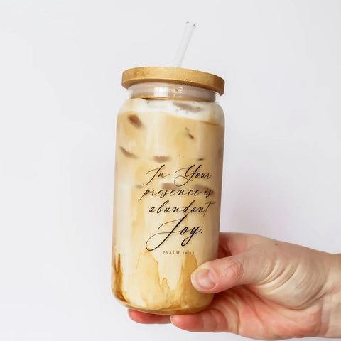 Grace & Joy Company Abundant Joy 18 oz. Glass Cold Brew Tumbler held in a hand