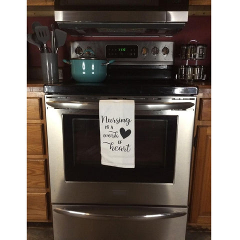 Virah Bella Nursing is a Work of Heart kitchen towel on front of stove