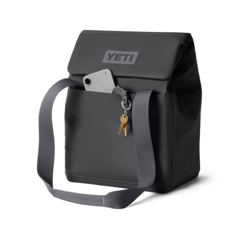 Charcoal Yeti Daytrip 14L Insulated Tote Lunch Bag showing items in front pocket