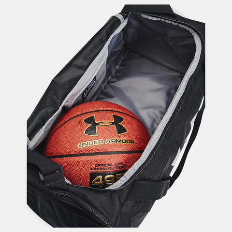 Basketball inside Under Armour Undeniable 5.0 black duffle bag