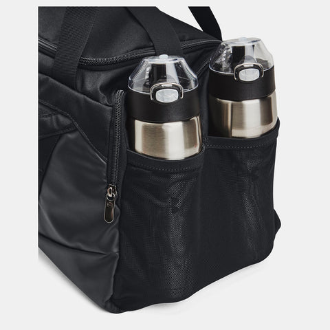 Bottles in mesh pockets on Under Armour Undeniable 5.0 black duffle bag