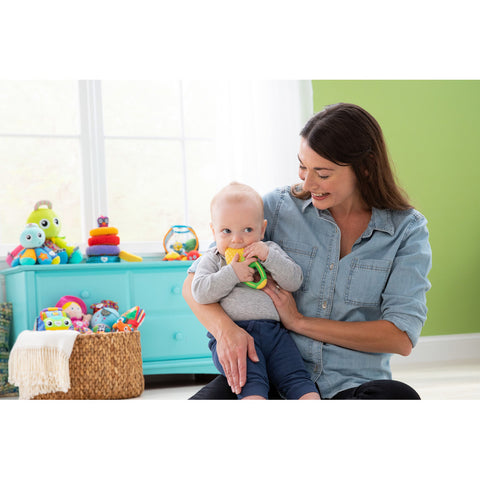 Child chewing on teether