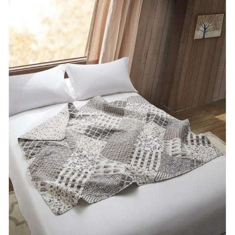 Gray patchwork quilt
