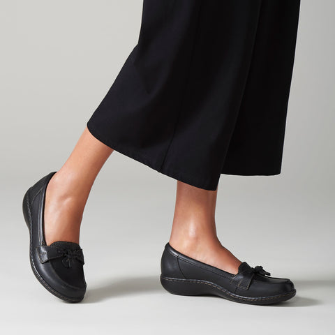 Lady wearing shoes.