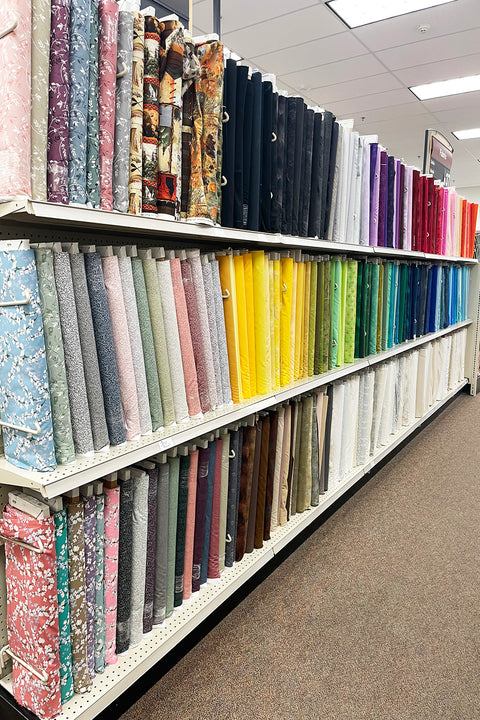 aisle with bolts of fabric