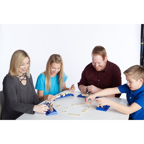 Family playing Rummikub game