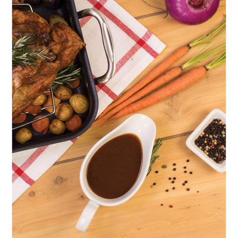 Gravy boat on dinner table