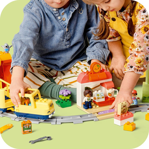 children playing, LEGO Duplo Town Big Interactive Community Train Set 10428