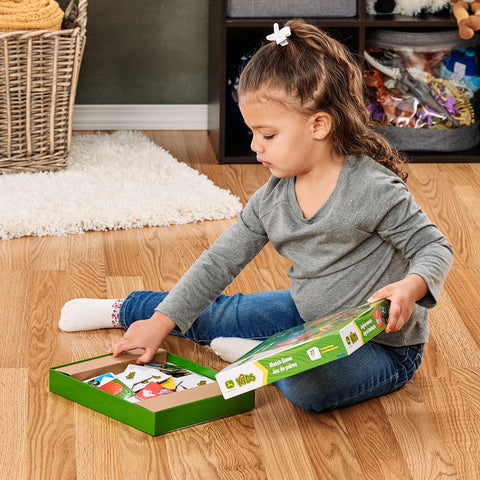 Girl opening box