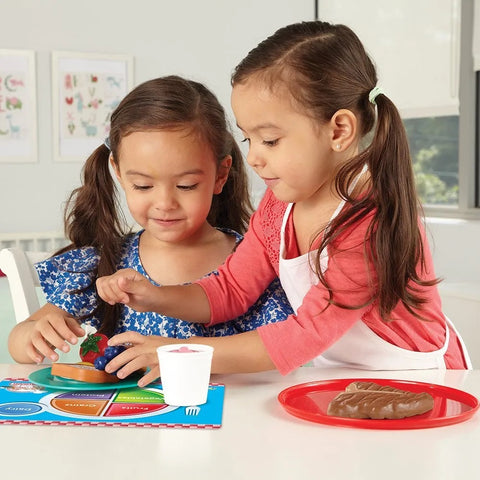 Girls Playing Restaurant