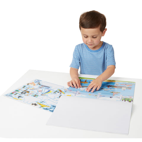 boy with sticker pad