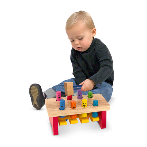 boy with pounding bench