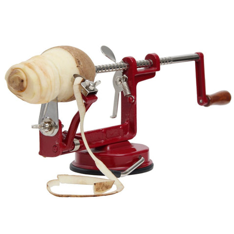 Peeling potato with hand-cranked peeler