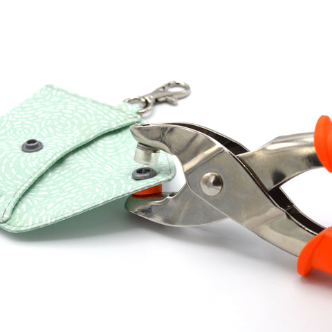 plastic snaps pliers in use