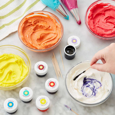 Using toothpick to color frosting