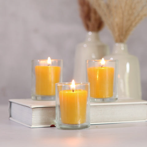 Big Dipper Wax Works pure beeswax votive candles burning