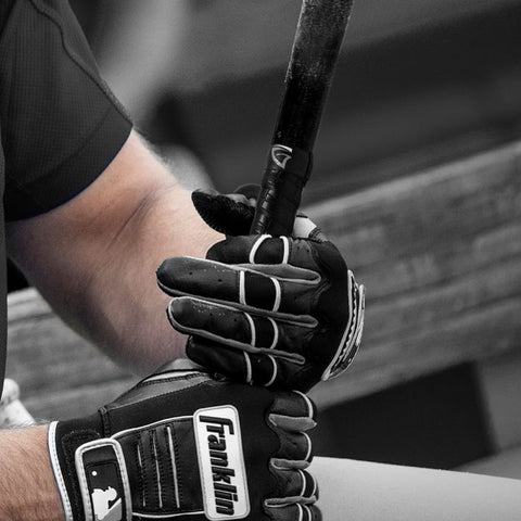 man holding bat with grip tape