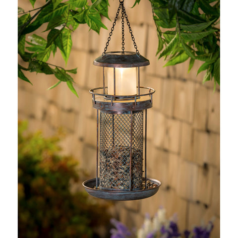 Birdfeeder Lighthouse Lit Up at Night