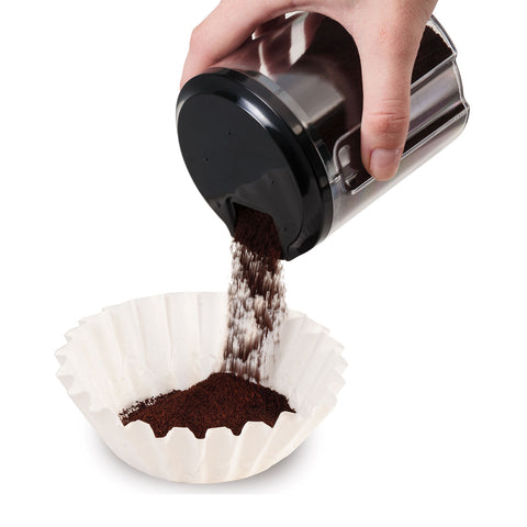 Coffee Grounds Pouring into Filter