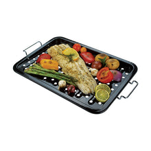 steel grill topper showing food