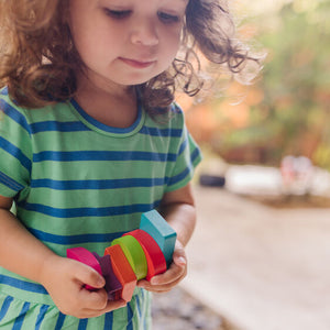 Child with puzzle pieces