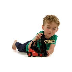 Boy Playing with Fork Lift