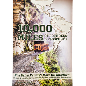 Front Cover of 10,000 Miles of Potholes & Passports: Bus driving on mountain road; map of South America