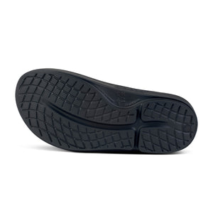 Oofos Ooahh Luxe Slide Sandal in frost showing sole