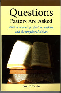 front cover of QUESTIONS PASTORS ARE ASKED featuring a picture of an open Bible
