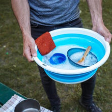 man washing dishes in Collapsible Sink 2082