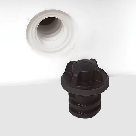 Vortex Drain Plug Sitting Beside White YETI Tundra Cooler
