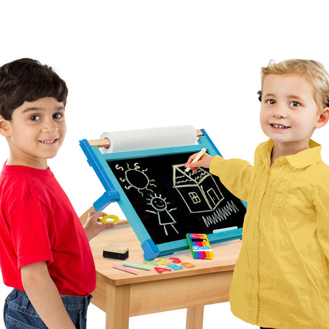 boys using easel chalkboard