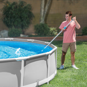 Man Cleaning Pool