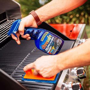 Person Spraying Citrusafe Cleaner on Grill