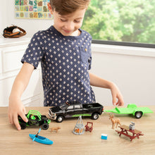 Little Boy Playing with Arctic Off-Road Set