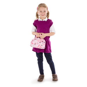 girl with diaper bag