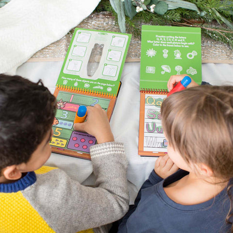 water pen and alphabet pad in use