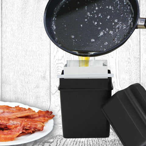 Trap the Grease Fat Trapper System 600-02 with frying pan grease being poured into it
