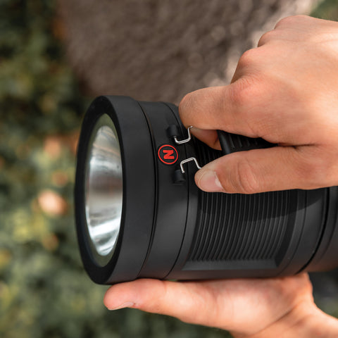 Person Holding Spot Light