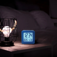 Soft Cube Blue LCD Alarm Clock 73005 with soft glow night lighting on